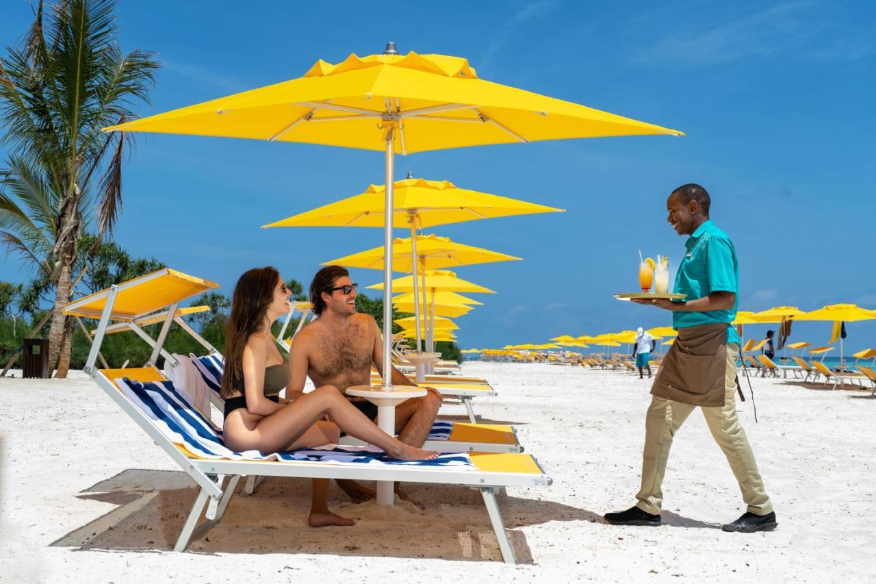 The Mora Zanzibar Hotel Matemwe  Exterior photo Beach service at Atlantis Paradise Island