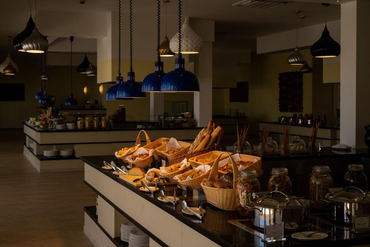 The Mora Zanzibar Hotel Matemwe  Exterior photo A buffet at a hotel