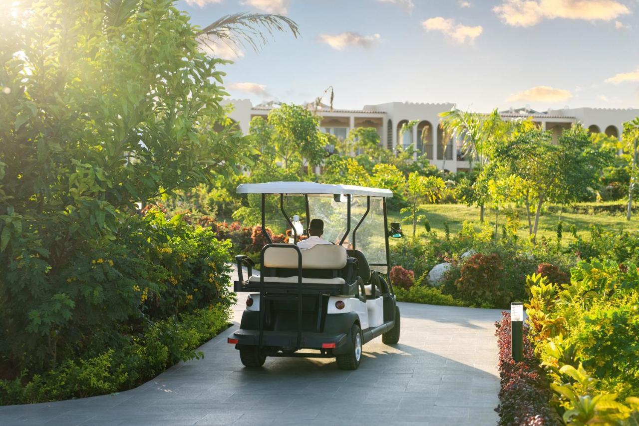 The Mora Zanzibar Hotel Matemwe  Exterior photo Golf cart at the Four Seasons Resort